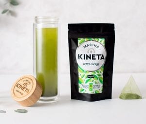 Kineta Matcha Infusion pods next to a matcha tea bag and a cold brew infusion bottle